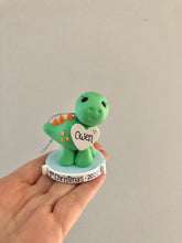 Load image into Gallery viewer, Dinosaur First Christmas ornament personalized
